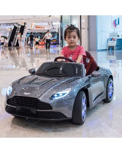 Children's electric car ASTON MARTIN DB11 with rubber tires and leather seat, 6 image