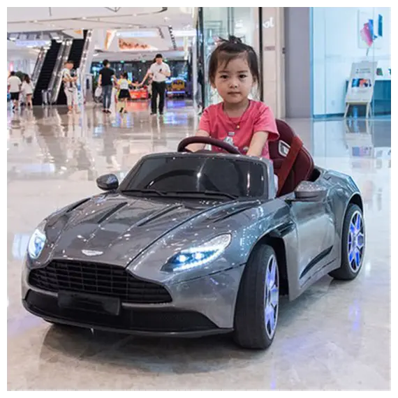ბავშვის ელექტრო მანქანა ASTON MARTIN DB11 კაუჩუკის საბურავებით და ტყავის სკამით , 6 image - Primestore.ge
